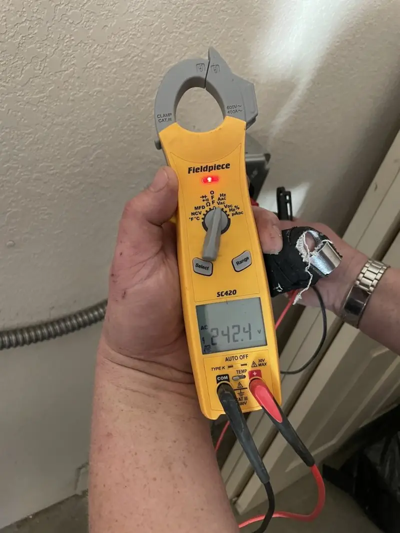 Voltage testing with clamp meter during Hot Tub / Pool Electrical Wiring in Moore
